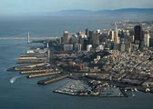 An aerial view of downtown San Francisco, the waterfront and the Oakland Bay Bridge.