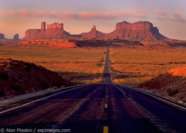 The highway leading into Monument Valley at dawn.