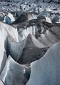 The glacier was filled with crevasses and interesting ice structures. This pyramid pair caught my attention immediately.