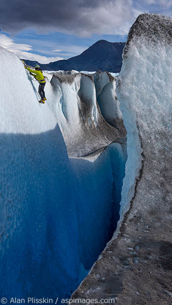 This ranger was practicing her ice climbing skills coming out of a crevasse on the Viedma Glacier in Parque Nacional de Glaciers in Patagonia region of Argentina.