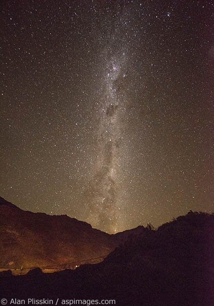 There is very little light pollution in this part of Chile.  The Milky Way covered much of the overhead sky and was clearly visible.  This image was looking south and the ridge nearby was illuminated as a vehicle passed by.