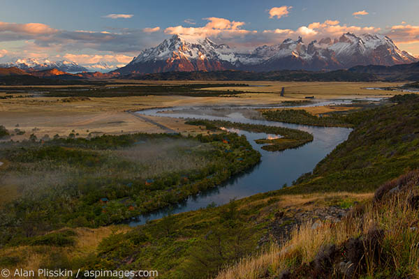 As the sun was rising the fog in the valley of the Rio Serrano was constantly changing.  The morning was peaceful and serene and the mountains of Cerro Paine Grande absorb the beautiful morning light.